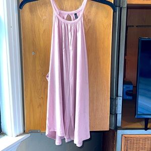 Small pink tank top. Gently used. Good condition.